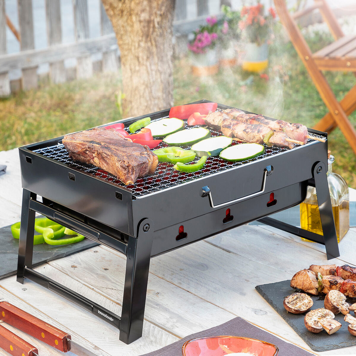 Klappbarer tragbarer Grill für die Verwendung mit Holzkohle BearBQ InnovaGoods - AWK Flagship