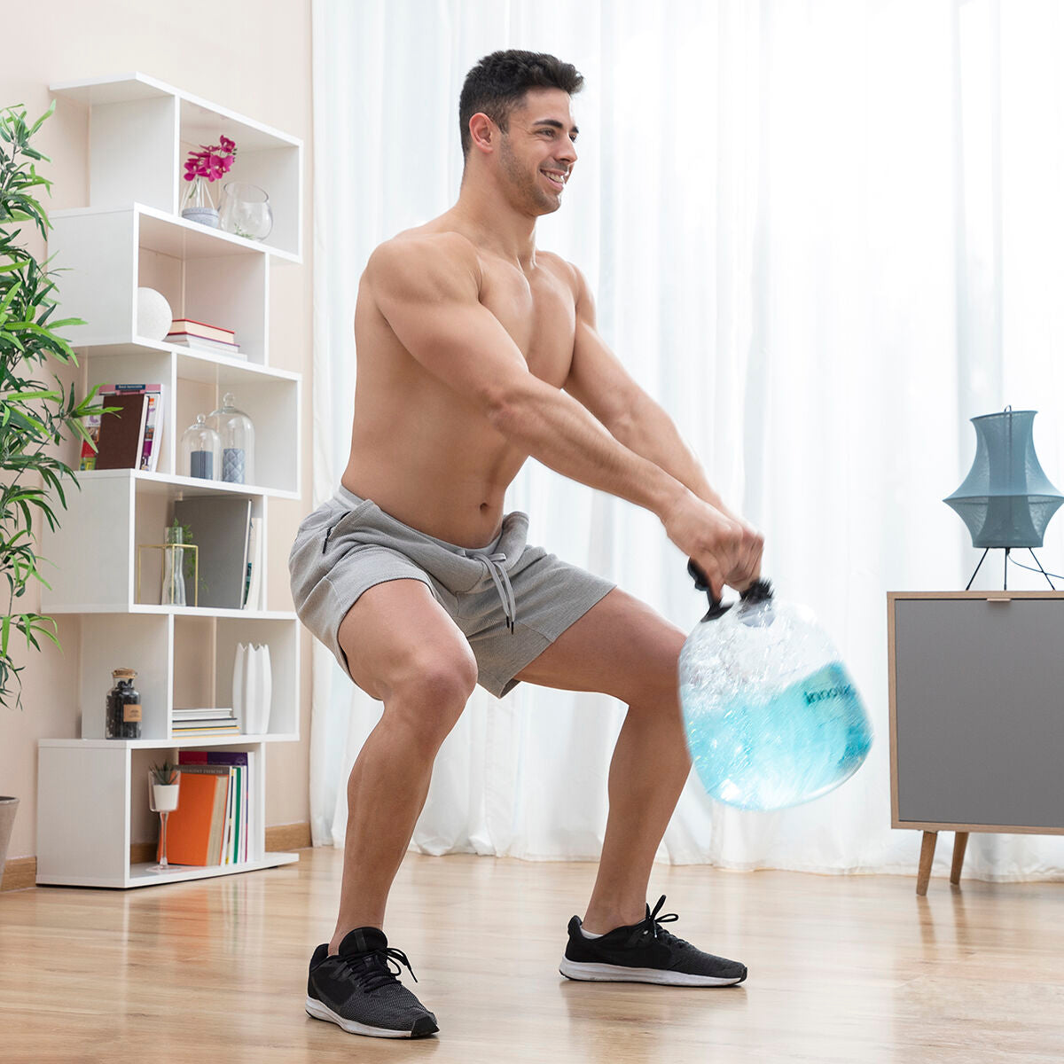 Wassergefüllte Kettle Bell für das Fitnesstraining – mit Übungsanleitung Fibell InnovaGoods - AWK Flagship